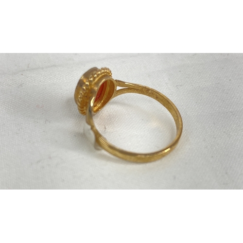 167 - A 9ct gold and cameo ring, size K.