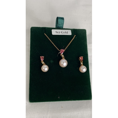 176 - A 9ct gold pink sapphire diamond and pearl set, 18