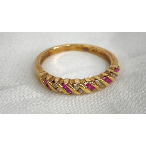 182 - A 9ct gold ruby and diamond ring, size R.