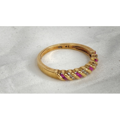 182 - A 9ct gold ruby and diamond ring, size R.