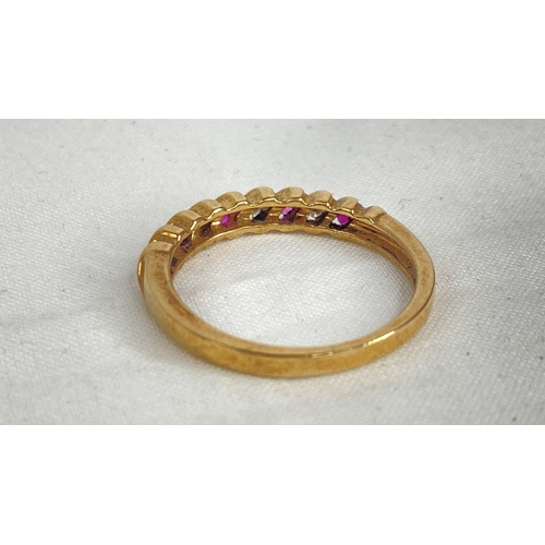 182 - A 9ct gold ruby and diamond ring, size R.