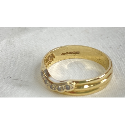 187 - A 9ct gold and diamond ring.