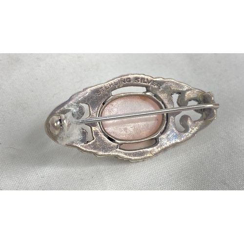 188 - A vintage silver rose quartz and marcasite brooch.