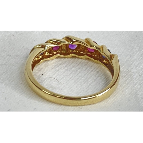 190 - A 9ct gold ring set with sapphire, ruby and amethyst.