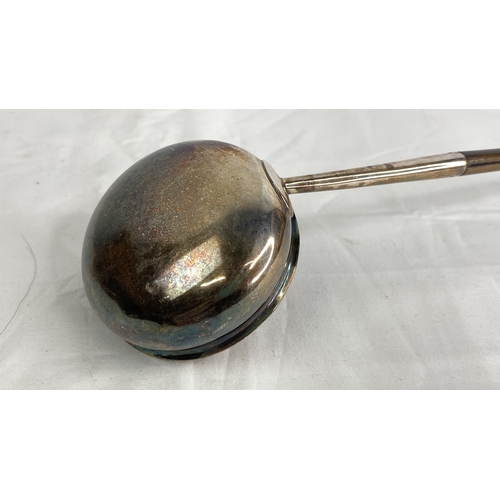 193 - A large Georgian Sterling silver punch ladle with whalebone handle circa 1800.