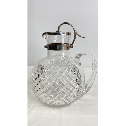 199 - A superb Victorian cut glass and Sterling silver claret/wine jug in the manner of Dr Christopher Dre... 