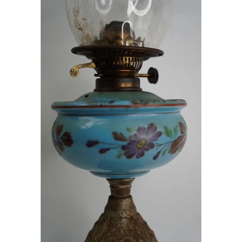 121 - A vintage cottage oil lamp with hand painted font.