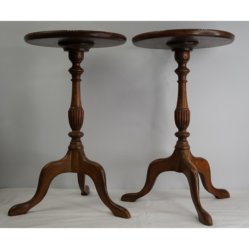 125 - Two wooden wine tables on tripod base.