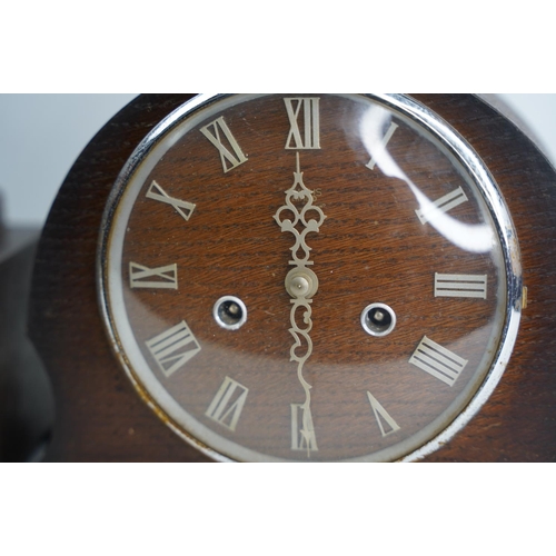 126 - Two vintage wood cased mantle clocks.