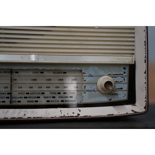 136 - A vintage EKCO table top valve radio and another.