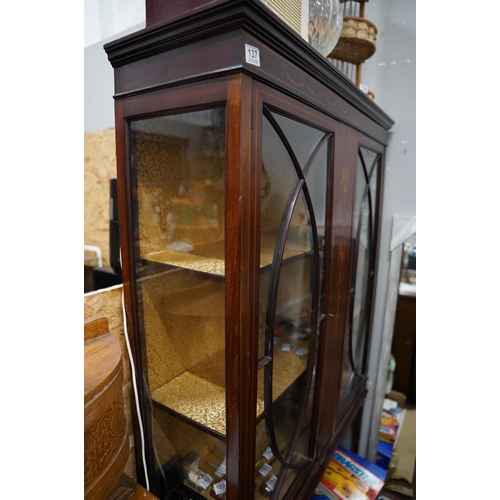 137 - A stunning antique mahogany and inlay display cabinet.