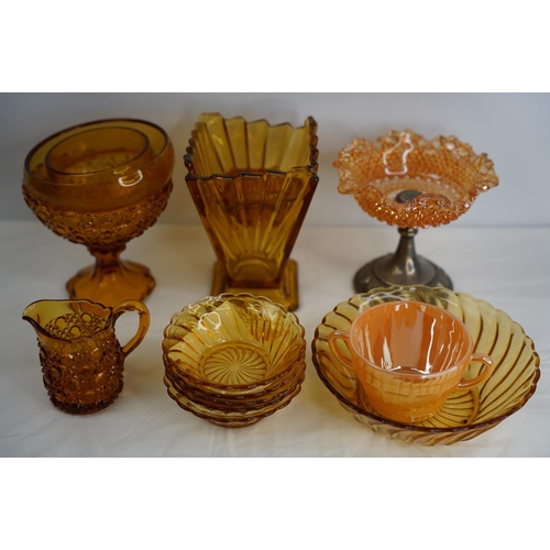 205 - A large lot of vintage amber glass ware.