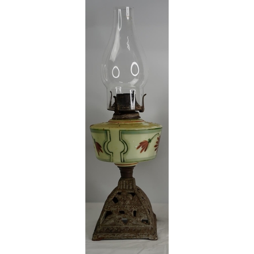 207 - A vintage hand painted Uranium glass cottage style oil lamp.