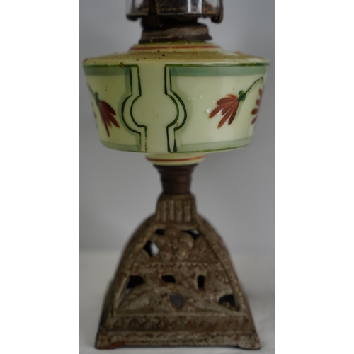 207 - A vintage hand painted Uranium glass cottage style oil lamp.