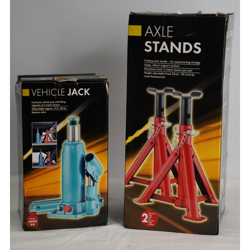 220 - A pair of boxed axle stands & bottle jack.