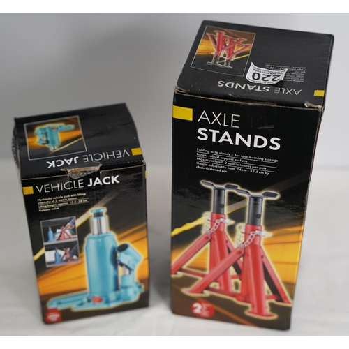 220 - A pair of boxed axle stands & bottle jack.