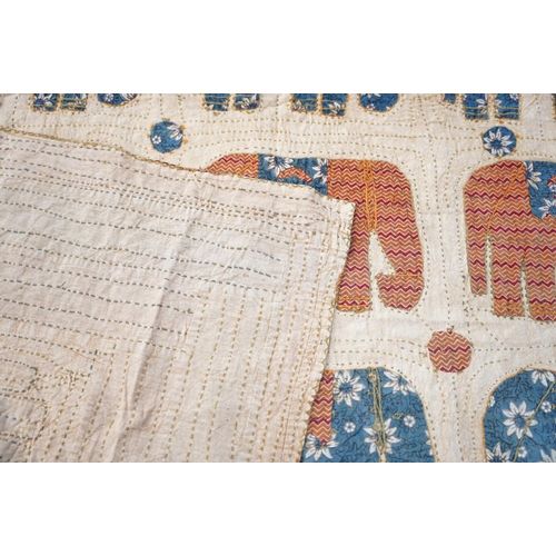 227 - A stunning vintage patchwork throw with elephant design.