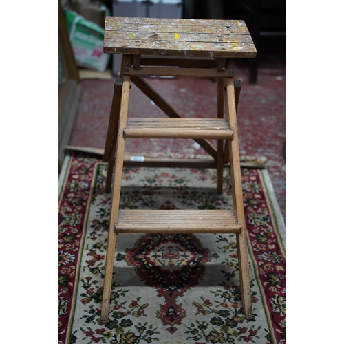 229 - A vintage set of wooden folding steps.