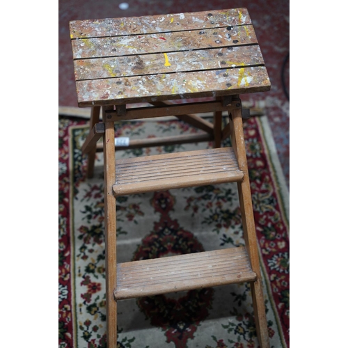 229 - A vintage set of wooden folding steps.