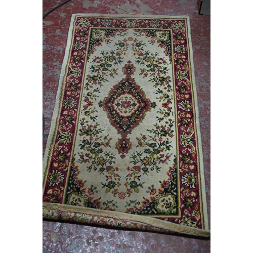 230 - A floral patterned floor runner.