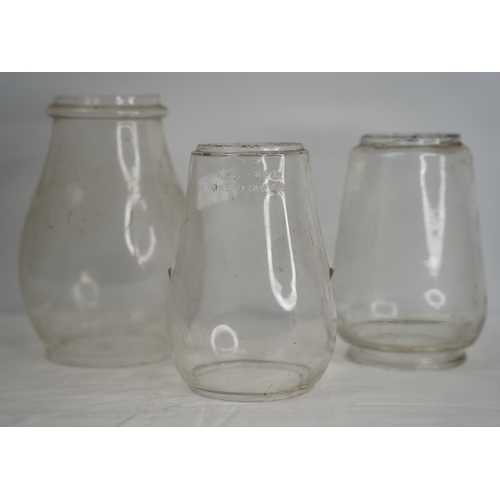 257 - Three vintage Tilley oil lamp shades.