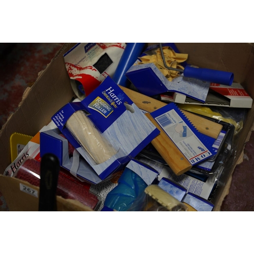 267 - A large box lot of assorted paint brushes, rollers etc.