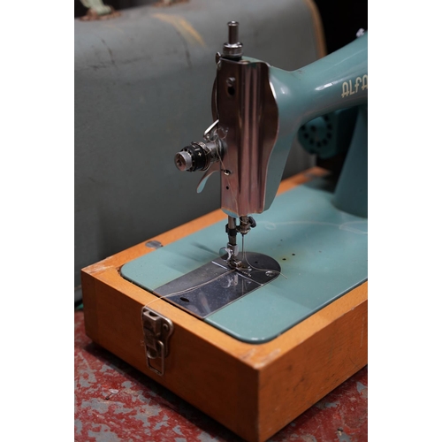 270 - A vintage Alfa sewing machine.