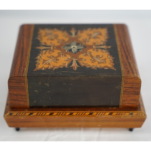 281 - A decorative wooden musical cigarette box.