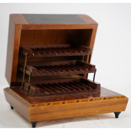 281 - A decorative wooden musical cigarette box.