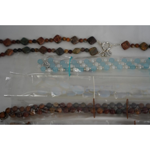 295 - A lot of new turquoise and beaded necklaces and bracelets etc.