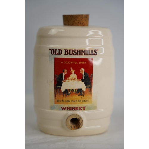 296 - An Old Bushmills Whiskey barrel shaped decanter.