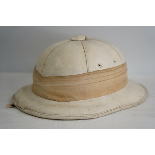 306 - A vintage pith helmet, possibly military.