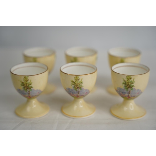 310 - A set of 6 Aynsley bone china egg cups.