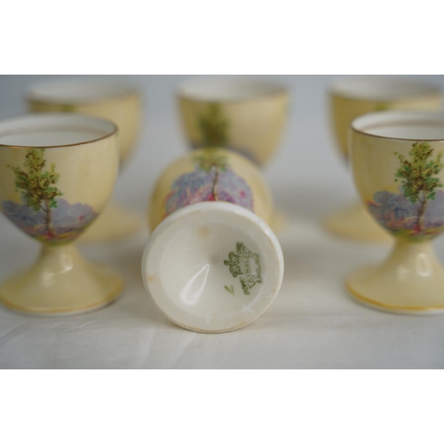 310 - A set of 6 Aynsley bone china egg cups.