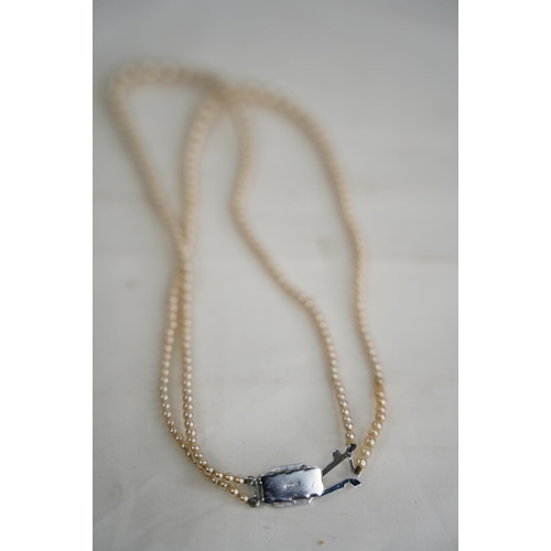 313 - A vintage cased Lotus pearl necklace.