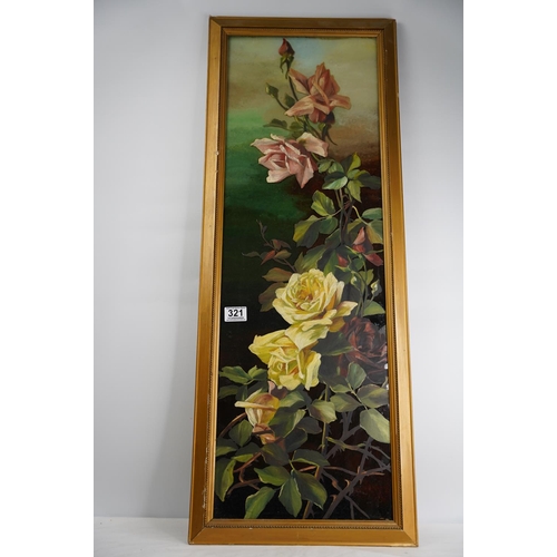 321 - A gilt framed floral painting on glass.