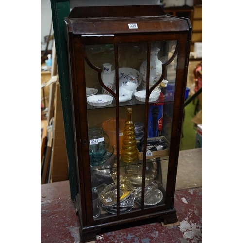 335 - A mahogany astra glazed single door display cabinet.