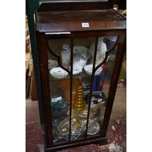 335 - A mahogany astra glazed single door display cabinet.