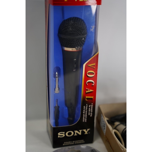 338 - A boxed Sony Vocal F-V220 microphone and more.