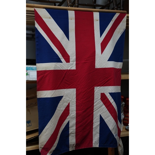 346 - A vintage Union Jack and pole.