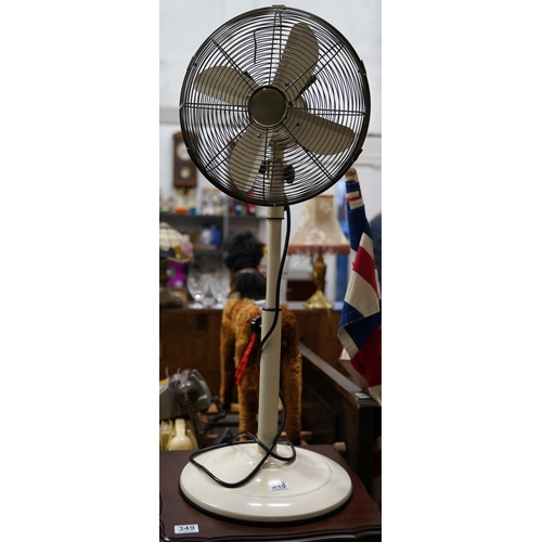 348 - A freestanding electric fan.