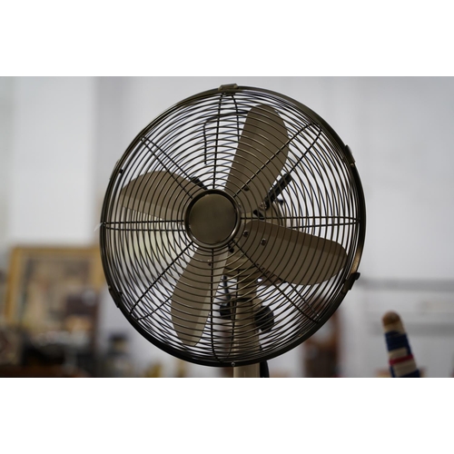 348 - A freestanding electric fan.