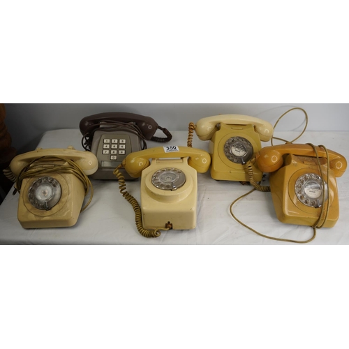 350 - Four vintage rotary telephones and another.