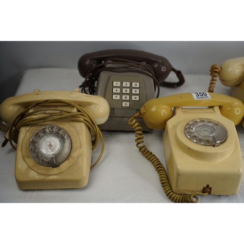 350 - Four vintage rotary telephones and another.