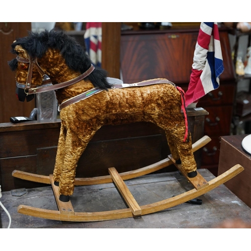 351 - A vintage rocking horse.