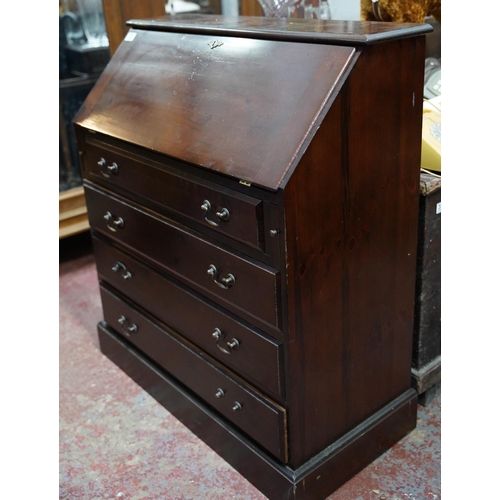 353 - A mahogany writing bureau.