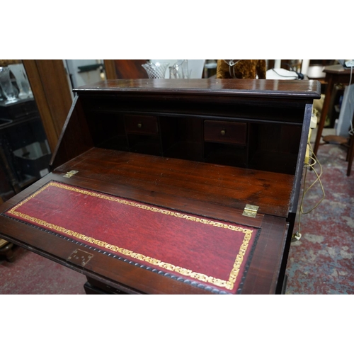 353 - A mahogany writing bureau.