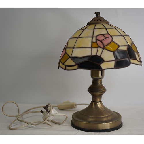 357 - A Tiffany style table lamp and shade.