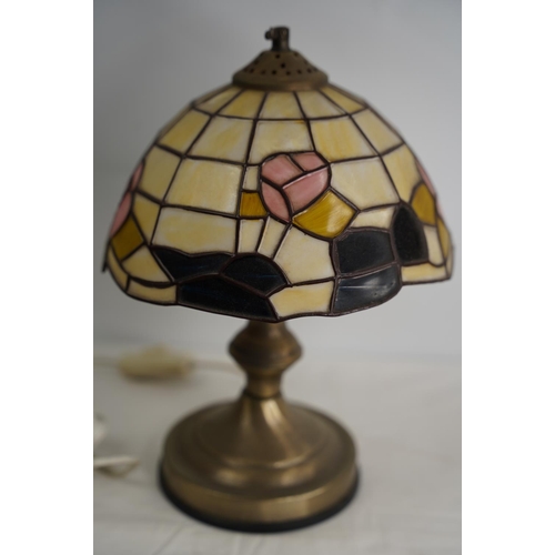 357 - A Tiffany style table lamp and shade.