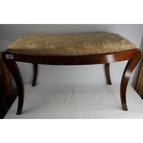 359 - A large mahogany upholstered piano stool.